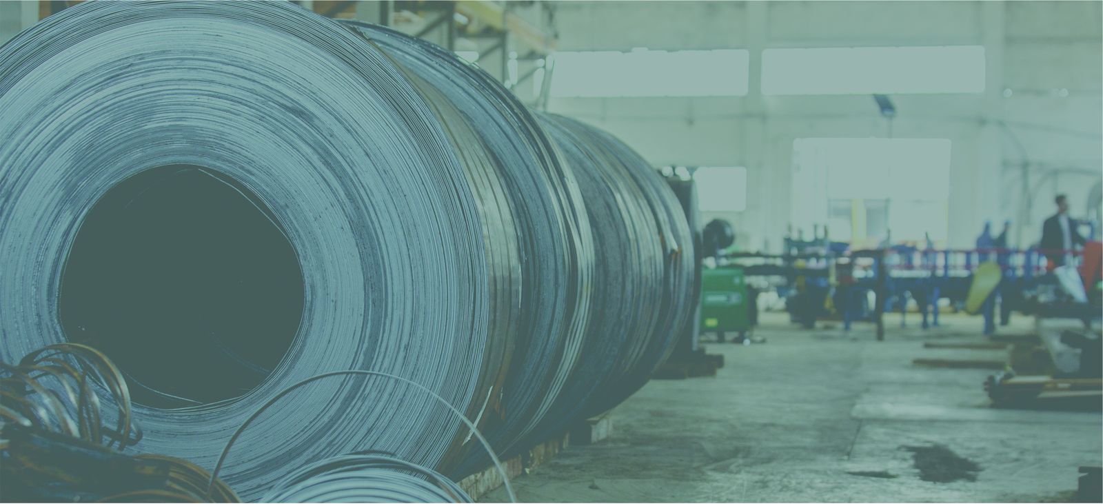 Steel coils on a metal processing shop floor